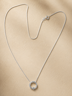 Circle of life with a shining light sterling silver pendant with CZ