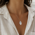 Dainty sterling silver pendant with flowers