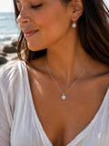 Dainty pendant in sterling silver inspired by cowry shells